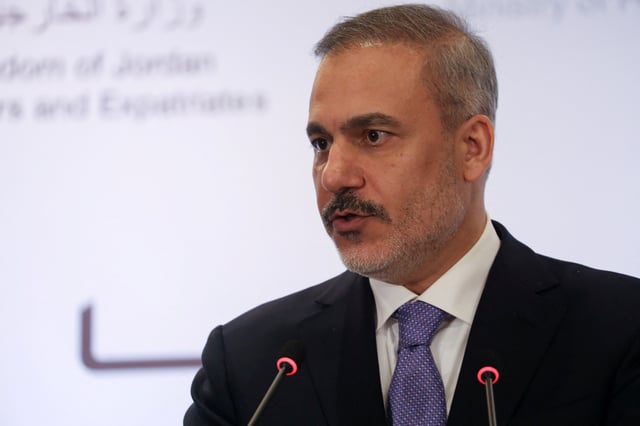 Turkish Foreign Minister Hakan Fidan attends a press conference after a meeting of delegations from Turkey, Jordan, Syria, Lebanon and Iraq, in Amman, Jordan, March 9, 2025. REUTERS/Alaa Al Sukhni/File Photo