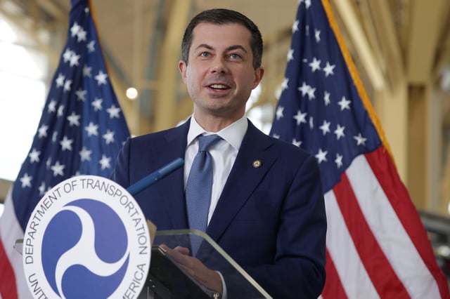 Pete Buttigieg speaks to questions during a news conference at Ronald Reagan Washington National Airport November 21, 2024 in Arlington, Virginia.