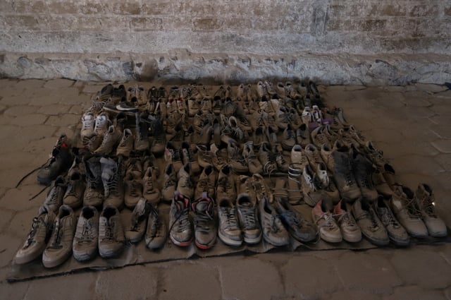 Shoes are displayed in a room of a ranch that is part of the crime scene where a mass grave was found in the western state of Jalisco, in Teuchitlan, Mexico, March 11, 2025.   Jalisco Attorney General Office/Handout via REUTERS/File Photo