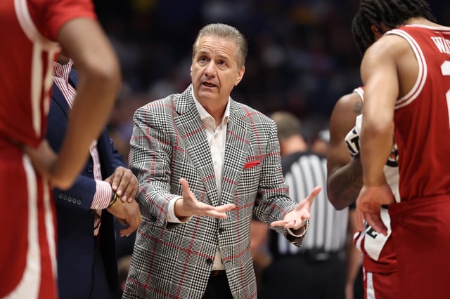 John Calipari the head coach of the Arkansas Razorbacks gives instructions to his team in the game against the Ole Miss Rebels during the SEC Men&#39;s Basketball Tournament. Arkanas would go on to lose this game.