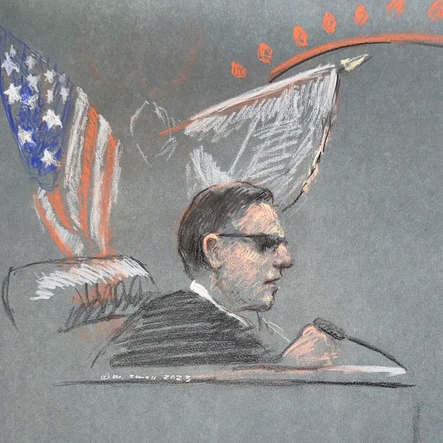 FILE - Massachusetts Air National Guardsman Jack Teixeira, right, appears in U.S. District Court in Boston, Friday, April 14, 2023. (Margaret Small via AP)