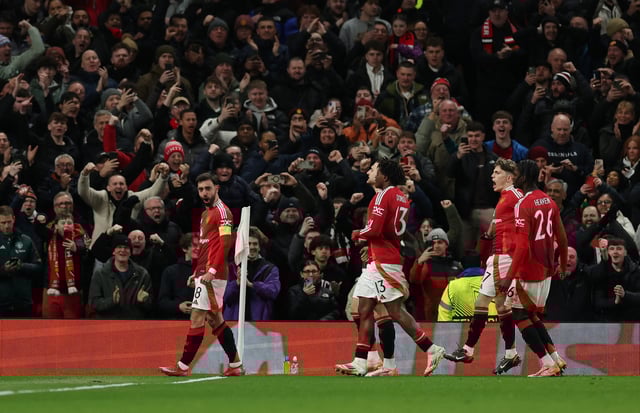 Soccer Football - Europa League - Round of 16 - Second Leg - Manchester United v Real Sociedad - Old Trafford, Manchester, Britain - March 13, 2025  Manchester United's Bruno Fernandes celebrates scoring their second goal with teammates REUTERS/Phil Noble