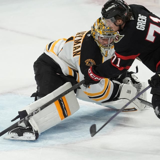 Ottawa Senators centre Ridly Greig scores on Boston Bruins goaltender Jeremy Swayman during first period NHL action, Thursday March 13, 2025 in Ottawa. THE CANADIAN PRESS/Adrian Wyld