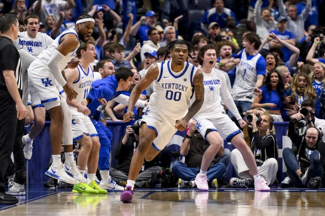 Mar 13, 2025; Nashville, TN, USA;  Kentucky Wildcats guard Otega Oweh (00) reacts after hitting the game winner as time runs out against the Oklahoma Sooners during the second half at Bridgestone Arena. Mandatory Credit: Steve Roberts-Imagn Images