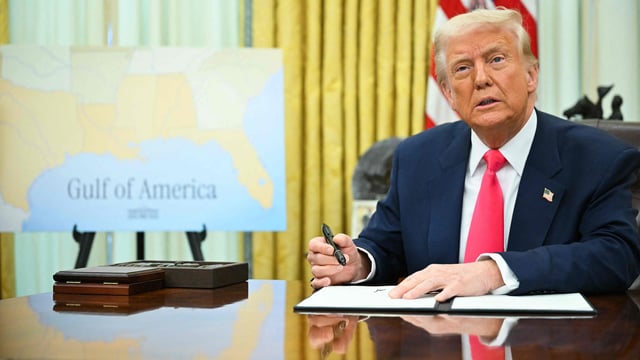 US President Donald Trump speaks as he signs an executive order in the Oval Office of the White House in Washington, DC.