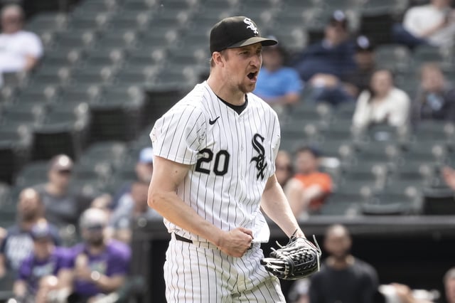 CHICAGO, ILLINOIS - APRIL 28: Erick Fedde #20 of the Chicago White Sox celebrates after an out in the eighth inning against the Tampa Bay Rays at Guaranteed Rate Field on April 28, 2024 in Chicago, Illinois.