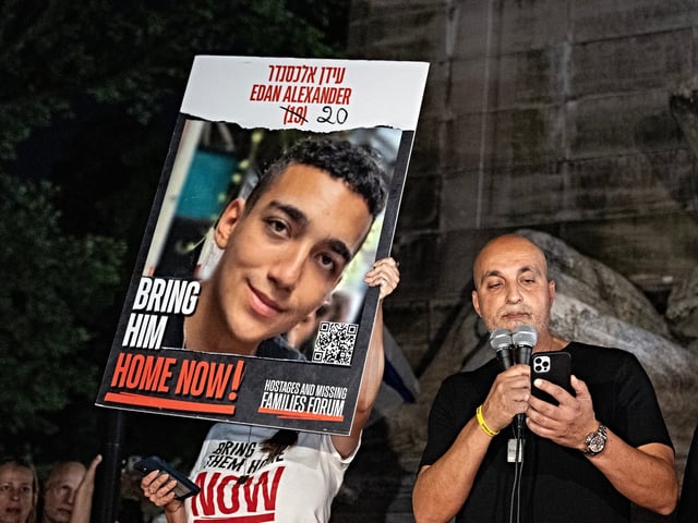 NEW YORK, UNITED STATES - 2024/09/01: Adi Alexander speaks with Yael Alexander at his side, parents of Edan Alexander held by Hamas in captivity at rally and memorial service at Columbus Circle for the 6 hostages who were kidnapped and murdered by Hamas. They demanded deal to release the remaining hostages. (Photo by Lev Radin/Pacific Press/LightRocket via Getty Images)