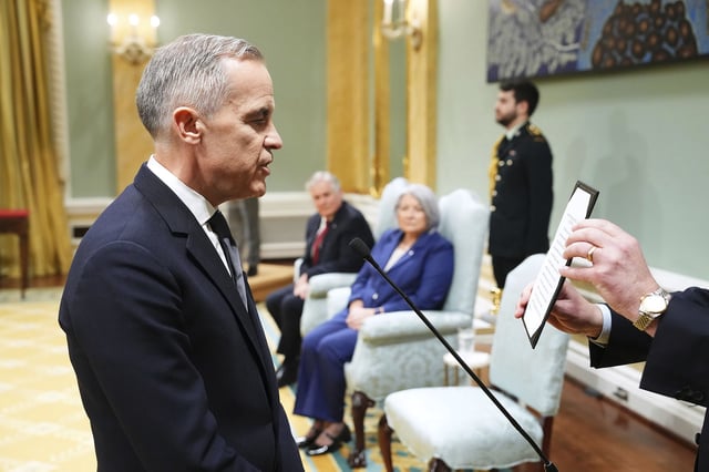 Mark Carney is sworn in as prime minister of Canada in Ottawa on Friday.