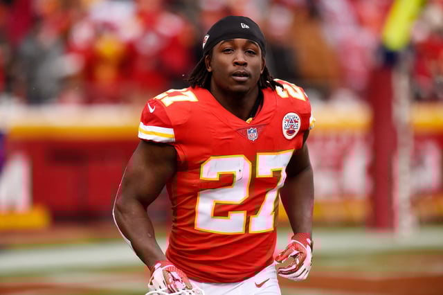 Running back Kareem Hunt of the Kansas City Chiefs runs to the sidelines just before kickoff in the game against the Miami Dolphins at Arrowhead Stadium on December 24, 2017, in Kansas City, Missouri. Hunt apologized on Sunday for his actions during a physical altercation with a woman.
