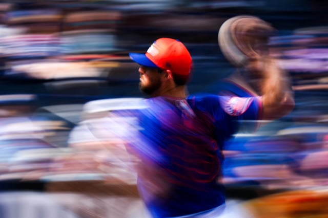 Clay Holmes #35 of the New York Mets throws a pitch against the Houston Astros during the third inning of a spring training game at Clover Park on February 27, 2025 in Port St. Lucie, Florida.