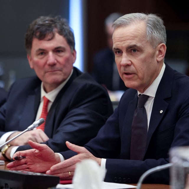 Canada's Prime Minister Mark Carney attends a cabinet meeting with Minister of International Trade and Intergovernmental Affairs Dominic LeBlanc on Parliament Hill in Ottawa, Ontario, Canada, March 14, 2025.  REUTERS/Patrick Doyle