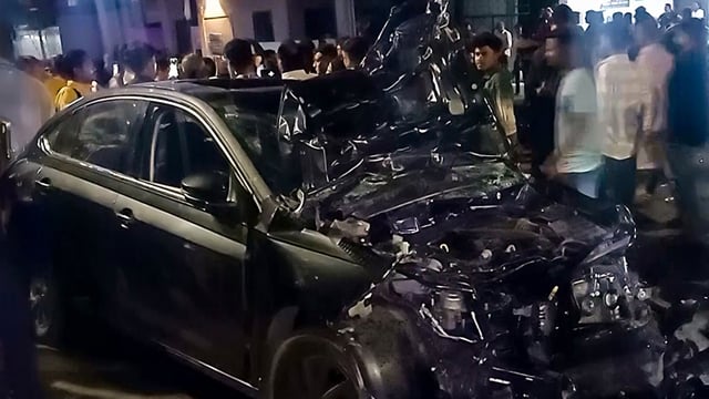 A look at the wrecked car following its collision with a two-wheeler in Vadodara on Thursday. One woman lost her life in the accident.