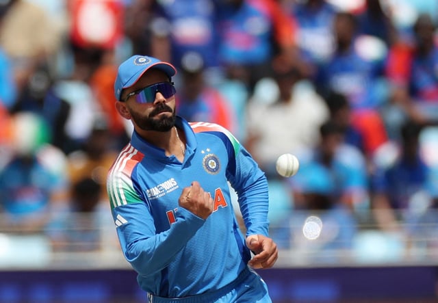 Cricket - ICC Men's Champions Trophy - Final - India v New Zealand - Dubai International Stadium, Dubai, United Arab Emirates - March 9, 2025 India's Virat Kohli in action fielding REUTERS/Satish Kumar/File Photo
