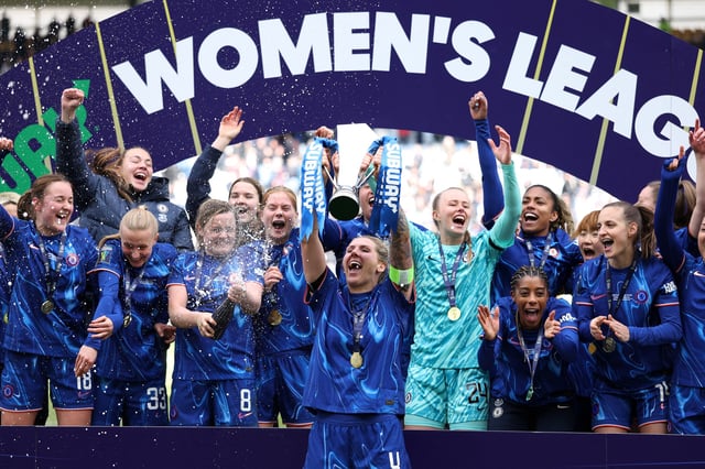Soccer Football - Women's League Cup - Final - Chelsea v Manchester City - Pride Park, Derby, Britain - March 15, 2025 Chelsea's Millie Bright celebrates with teammates and the trophy after winning the Women's League Cup Action Images via Reuters/John Sibley