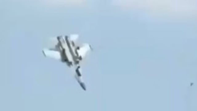 Chinese naval fighter jet crashes, pilot ejects successfully.