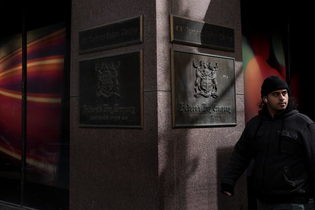 A man walks past the Hudson's Bay store in Toronto on Monday March 10, 2025. 