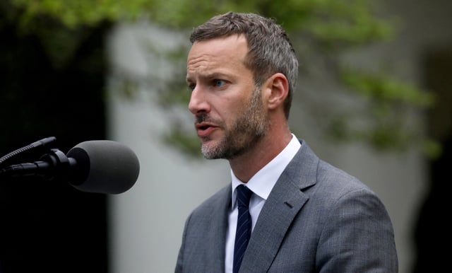 Adam Boehler, the CEO of the U.S. International Development Finance Corporation, addresses the daily coronavirus task force briefing in the Rose Garden at the White House in Washington, U.S., April 14, 2020. REUTERS/Leah Millis/File Photo