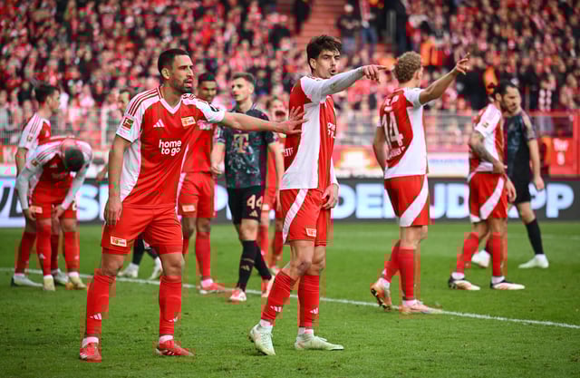 Soccer Football - Bundesliga - 1. FC Union Berlin v Bayern Munich - Stadion An der Alten Forsterei, Berlin, Germany - March 15, 2025 Union Berlin's Rani Khedira and Diogo Leite in action REUTERS/Annegret Hilse DFL REGULATIONS PROHIBIT ANY USE OF PHOTOGRAPHS AS IMAGE SEQUENCES AND/OR QUASI-VIDEO.