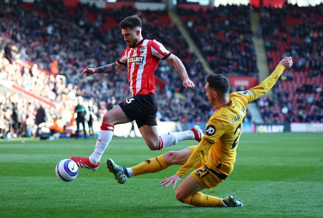 Soccer Football - Premier League - Southampton v Wolverhampton Wanderers - St Mary's Stadium, Southampton, Britain - March 15, 2025 Southampton's Ryan Manning in action with Wolverhampton Wanderers' Pablo Sarabia Action Images via Reuters/Matthew Childs