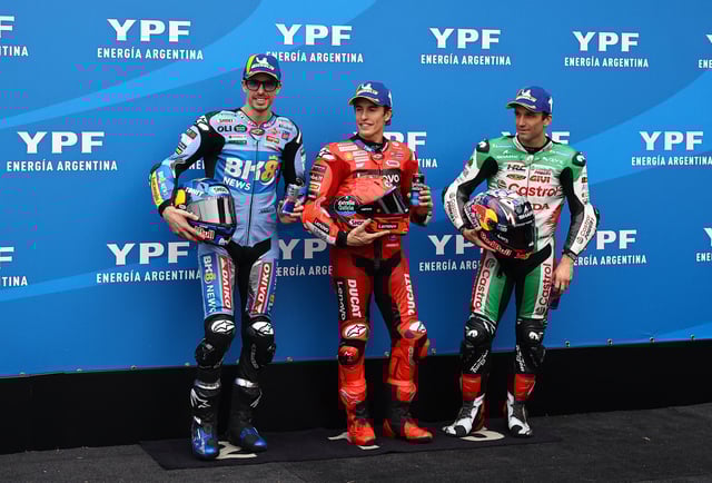 MotoGP - Argentina Grand Prix - Autodromo Termas de Rio Hondo, Santiago del Estero, Argentina - March 15, 2025 Ducati Lenovo Team's Marc Marquez celebrates after qualifying in first place alongside second placed BK8 Gresini Racing MotoGP's Alex Marquez and third placed LCR Honda's Johann Zarco REUTERS/Agustin Marcarian
