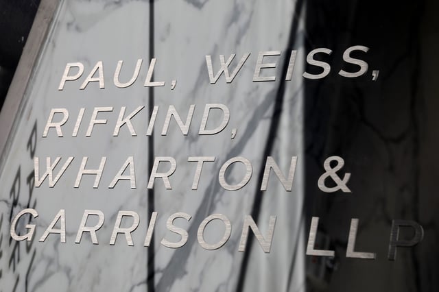 Signage is seen outside of the law firm Paul, Weiss, Rifkind, Wharton & Garrison LLP in Washington, D.C., U.S., August 30, 2020.