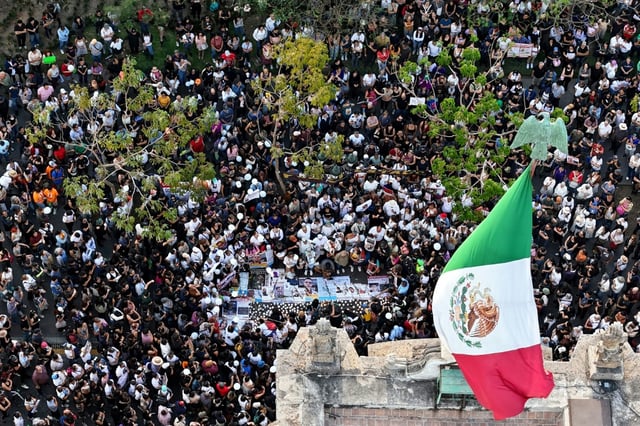 Protesters gathered across Mexico to demand justice following a grisly discovery of charred bones, shoes and clothing at a suspected drug cartel training ground