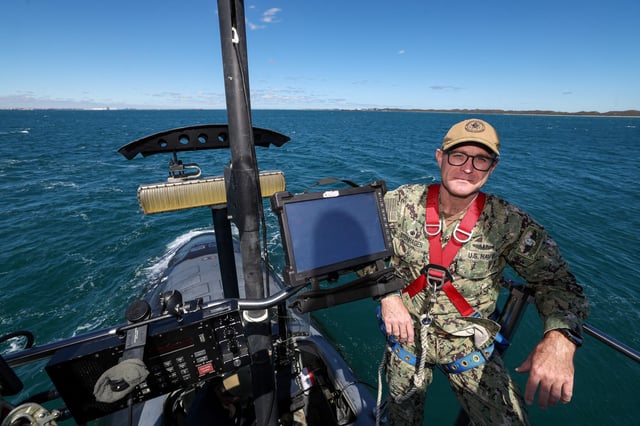 Captain Neil Stein Hagen Submarine Squadron 15 Commodore on the bridge of Virginia-class fast attack submarine USS Minnesota (SSN-783) off the coast of Western Australia, Australia March 16, 2025.