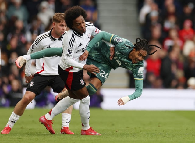 Soccer Football - Premier League - Fulham v Tottenham Hotspur - Craven Cottage, London, Britain - March 16, 2025 Tottenham Hotspur's Djed Spence in action with Fulham's Willian REUTERS/Isabel Infantes