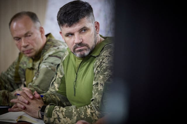 A recently appointed Brigadier-General Andriy Hnatov joint forces commander attends a meeting with Ukraine's President Volodymyr Zelenskiy during his visit to a frontline, amid Russia's attack on Ukraine, near the city of Pokrovsk, Donetsk region, Ukraine June 26, 2024. Ukrainian Presidential Press Service/Handout via REUTERS/File Photo