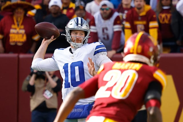 Dallas Cowboys quarterback Cooper Rush (10) passes against Washington Commanders safety Quan Martin (20) in the first half of an NFL football game at Northwest Stadium, Sunday, Nov. 24, 2024, in Landover, Maryland. (Chitose Suzuki/The Dallas Morning News/TNS)