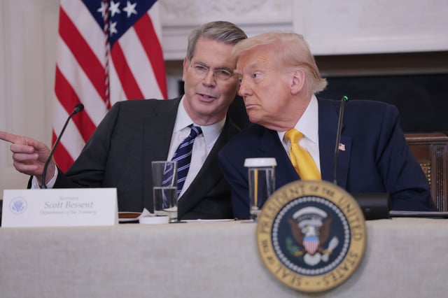 Treasury Secretary Scott Bessent and President Donald Trump look on during The White House Digital Assets Summit in the State Dining Room of the White House on March 7 in Washington, D.C.