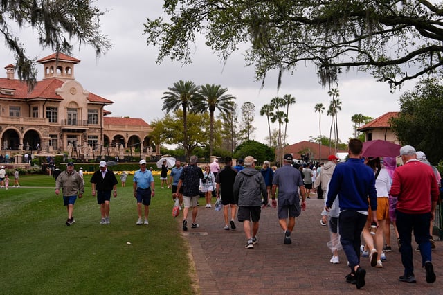 Fans walk near the clubhouse during the final round of The Players Championship golf tournament Sunday, March 16, 2025, in Ponte Vedra Beach, Fla. (AP Photo/Julia Demaree Nikhinson)