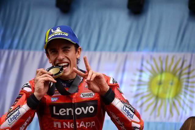 MotoGP - Argentina Grand Prix - Autodromo Termas de Rio Hondo, Santiago del Estero, Argentina - March 15, 2025 Ducati Lenovo Team's Marc Marquez poses for a photo with his medal on the podium as he celebrates after winning the sprint race REUTERS/Agustin Marcarian
