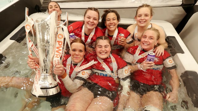 Pip Hendy, Tatyana Heard, Georgia Brock, Mia Venner, Maud Muir and Alex Matthews celebrate with the Premiership Women’s Rugby trophy after Gloucester made light of Saracens’ home advantage
