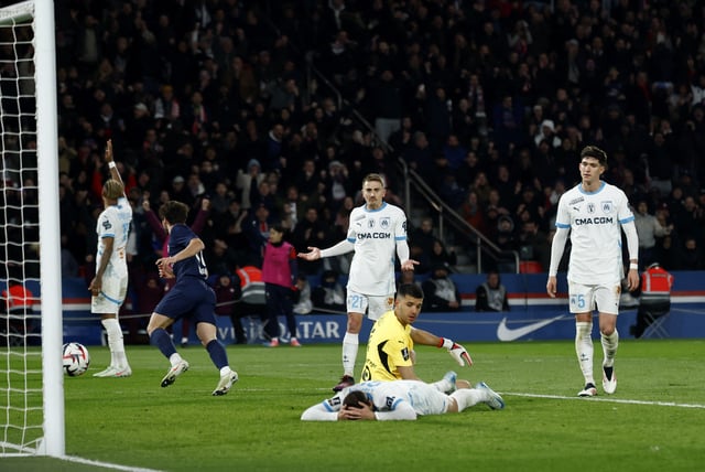Soccer Football - Ligue 1 - Paris St Germain v Olympique de Marseille - Parc des Princes, Paris, France - March 16, 2025 Olympique de Marseille's Pol Lirola reacts after scoring an own goal and the third goal for Paris St Germain REUTERS/Stephanie Lecocq