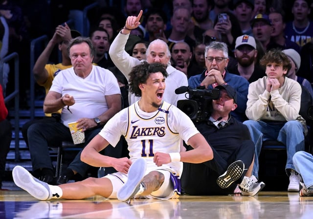 Lakers center Jaxson Hayes (11) celebrates a basket against the Phoenix Suns in the first half of an NBA basketball game Sunday, March 16, 2025, in Los Angeles. (AP Photo/Wally Skalij)