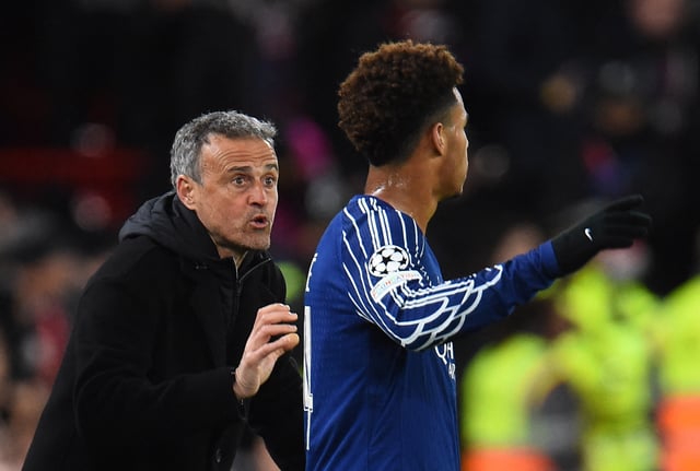 Soccer Football - Champions League - Round of 16 - Second Leg - Liverpool v Paris St Germain - Anfield, Liverpool, Britain - March 11, 2025 Paris St Germain coach Luis Enrique and Desire Doue REUTERS/Peter Powell/File Photo