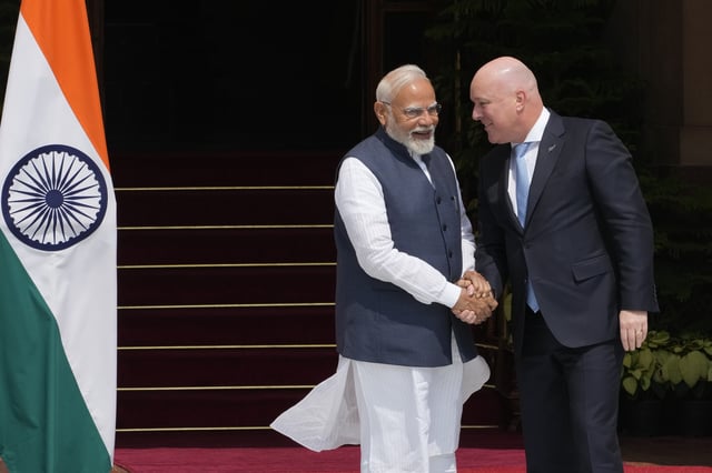 Indian Prime Minister Narendra Modi, left, greets visiting New Zealand Prime Minister Christopher Luxon before their meeting in New Delhi, India, Monday, March 17, 2025. (AP Photo/Manish Swarup)