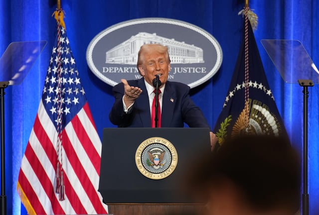 President Donald Trump gestures while speaking at the Justice Department March 14, 2025 in Washington, DC.