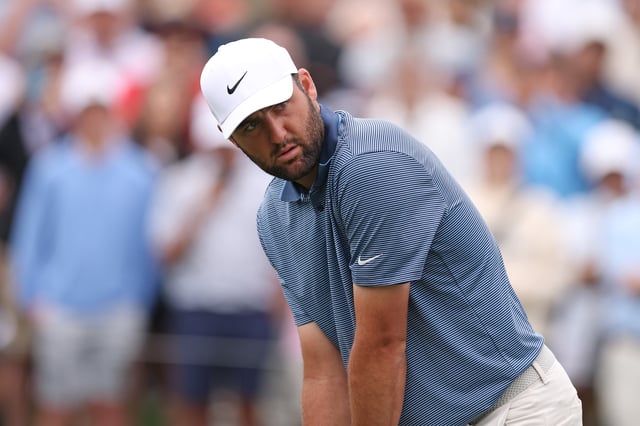 MARCH 16: Scottie Scheffler of the United States lines up a shot on the third tee during the final round of THE PLAYERS Championship on the Stadium Course at TPC Sawgrass on March 16, 2025 in Ponte Vedra Beach, Florida.