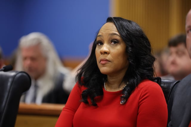 Fulton County District Attorney Fani Willis looks on during a hearing in the case of the State of Georgia v. Donald John Trump at the Fulton County Courthouse on March 1, 2024, in Atlanta, Georgia.