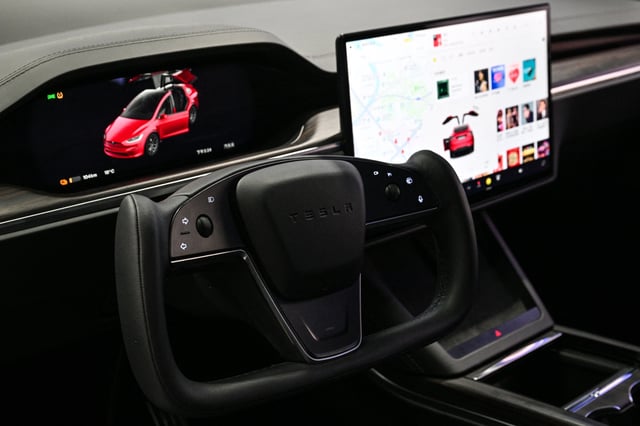 The dashboard of a Tesla Model X is seen at a showroom for the US electric vehicle maker at a mall in the Changning district of Shanghai on February 25, 2025.
