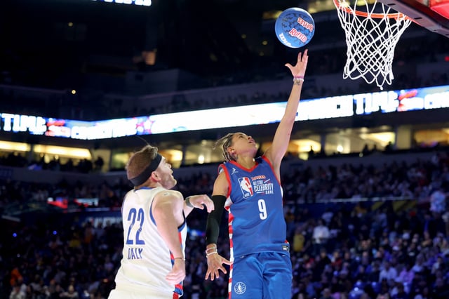 Feb 16, 2024; Indianapolis, IN, USA; Natasha Cloud (9) of Team Stephen A shoots against Conor Daly (22) of Team Shannon in the second quarter during the All Star Celebrity Game at Lucas Oil Stadium. Mandatory Credit: Trevor Ruszkowski-USA TODAY Sports/File Photo