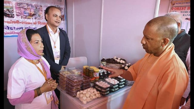 UP chief minister Yogi Adityanath visits stalls at Yuva Udyami Vikas Abhiyan programme in Saharanpur district. (@myogiadityanath via PTI Photo)