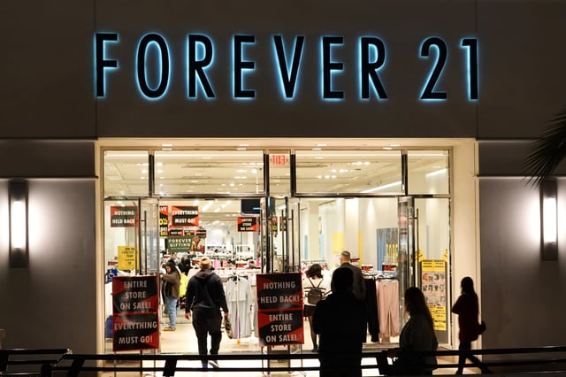 Shoppers walk into a Forever 21 store at Fashion Valley, an upscale shopping mall on December 13, 2024 in San Diego, California.