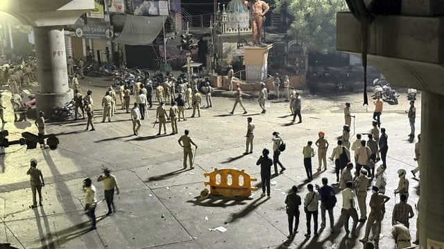 Police dispersed an agitating crowd as communal tension prevailed Chitnis Park area following the VHP-Bajrang Dal protest, in Nagpur.