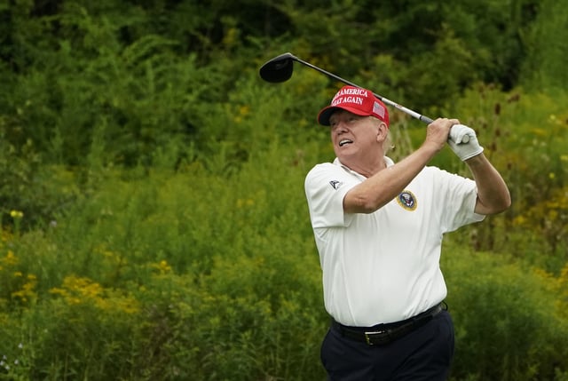 Donald Trump plays golf during the Official Pro-Am Tournament ahead of the LIV Golf Invitational Series event at Trump National Golf Club Bedminster in Bedminster, New Jersey, on August 10, 2023.