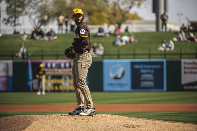 SURPRISE, ARIZONA - MARCH 6: Dylan Cease #84 of the San Diego Padres pitches during a spring training game against the Texas Rangers at Surprise Stadium on March 6, 2025 in Surprise, Arizona.