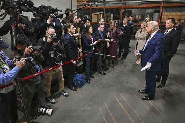 President Donald Trump talks with reporters as he visits the John F. Kennedy Center for the Performing Arts in Washington, Monday, March 17.