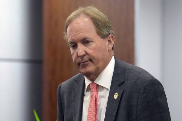 Texas Attorney General Ken Paxton appears at a pretrial hearing in his securities fraud case before state District Judge Andrea Beall, Tuesday, March 26, 2024 at Harris County Criminal Courts at Law in Houston.
